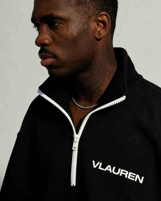 QUARTER ZIP